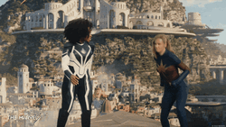 Captain Marvel Running From Attack GIF
