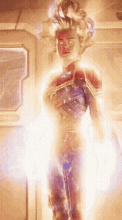 Captain Marvel Standing In Bright Room GIF