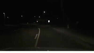 Car Driving At Night Headlights On GIF