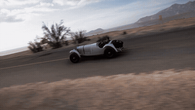 Car Driving Desert Road With Mountains GIF