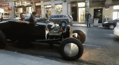 Car Driving Down Desert Road With Mountains GIF