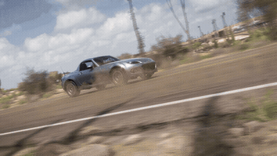 Car Driving Down Dirt Road GIF