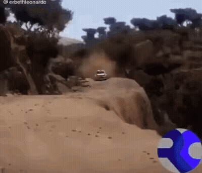 Car Driving Down Dirt Road GIF