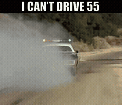 Car Driving Down Dirt Road With Smoke GIF