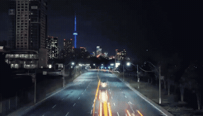 Car Driving Down Highway At Night GIF