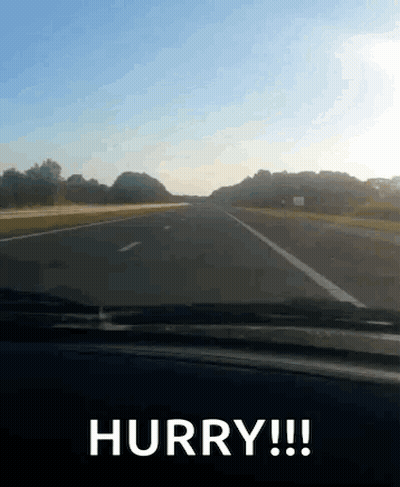 Car Driving Down Highway Saying Hurry GIF