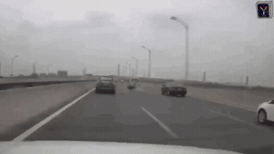 Car Driving Down Highway With Y Sign GIF