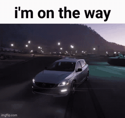 Car Driving Down Road At Night Saying I'm On The Way GIF
