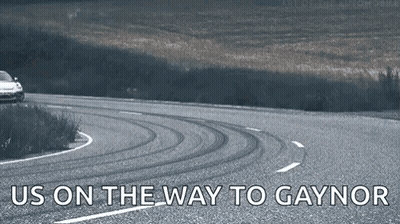 Car Driving Down Road Saying Us On The Way To Gaynor GIF