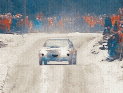 Car Driving Down Snowy Road GIF