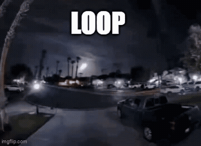 Car Driving Down Street At Night Saying Loop GIF