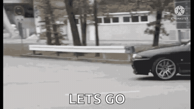 Car Driving Down Street Lets Go GIF