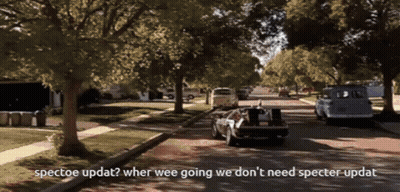 Car Driving Down Street Saying Spectoe Updat GIF
