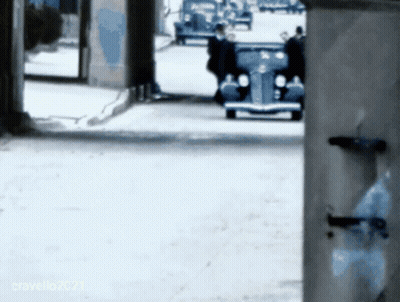 Car Driving Down Street With Cravello2021 Sign GIF