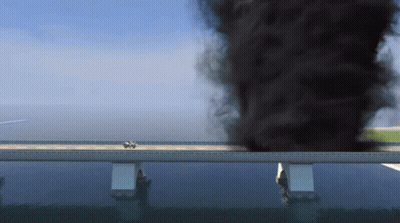 Car Driving On Bridge With Smoke From Water GIF