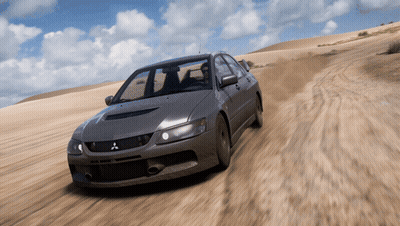 Car Driving On Dirt Road Blue Sky GIF