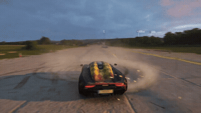 Car Driving On Dirt Road With License Plate A GIF