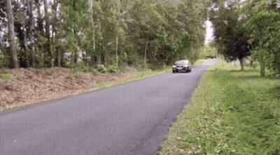 Car Driving On Road With Trees GIF