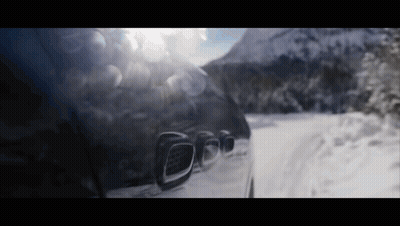 Car Driving On Snow Covered Road GIF