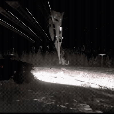Car Driving On Snowy Road At Night GIF