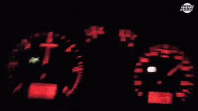 Car Driving On Street With Houses And Roger 5588 Sign GIF
