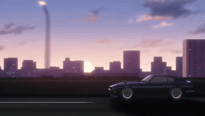 Car Driving Past City Skyline At Sunset GIF