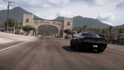 Car Driving Past Huracan Malaga Sign GIF