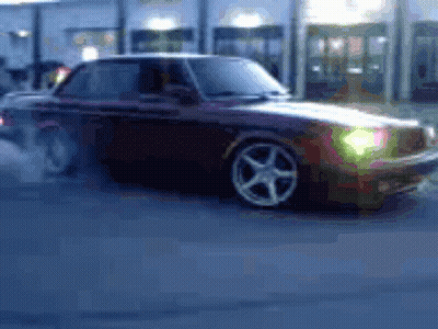 Car Driving With Smoking Tires GIF