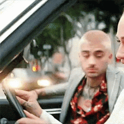 Car Driving Woman And Man Looking Back GIF
