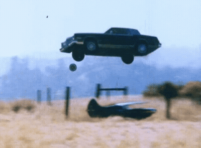 Car Flying Near Plane GIF