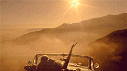 Car Flying Over Mountains GIF
