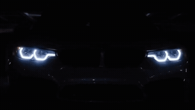 Car Headlights Lit Up Close Up GIF