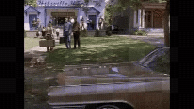 Car Parked In Front Of Mitchell Building GIF