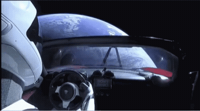 Car With Don't Panic Sign GIF