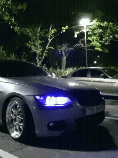 Car With License Plate 728 Parked At Night GIF