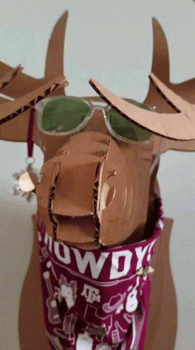 Cardboard Moose Wearing Sunglasses And Cowboy Bandana GIF