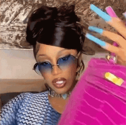 Cardi B Holding Bag GIF