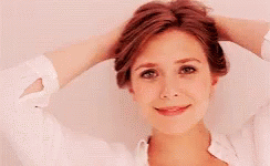 Carefree Elizabeth Olsen Smile GIF