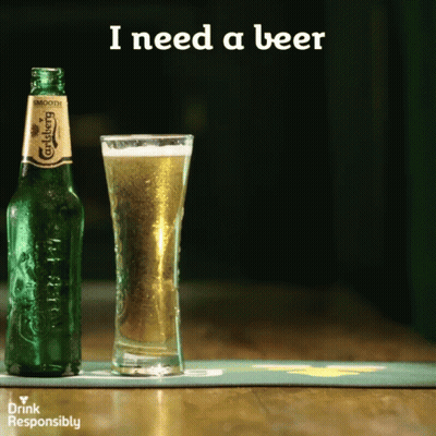 Carlsberg Bottle Next To Full Glass Of Beer GIF
