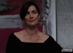Carrie-anne Moss Smiling Trying Not To Cry