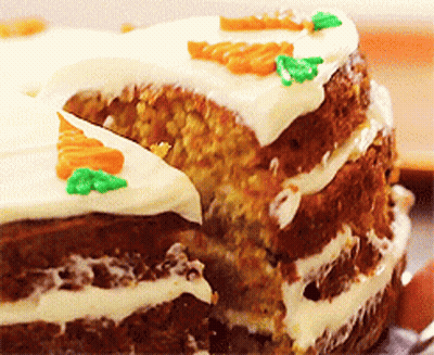 Carrot Cake With White Frosting And Carrots GIF