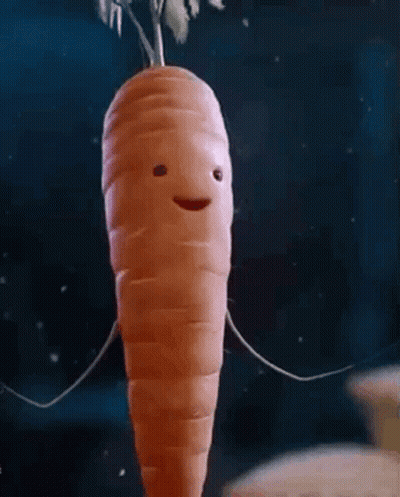 Carrot With Face Smiling In Dark GIF