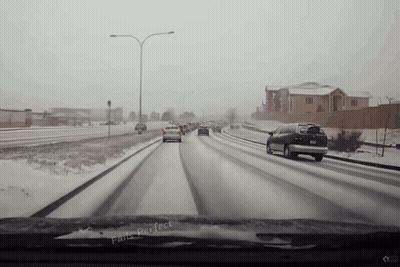 Cars Driving Down Snowy Highway Saying Perfect