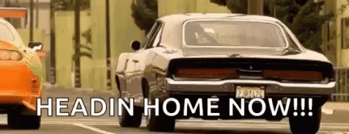 Cars Driving Down Street Saying Headin Home Now GIF
