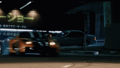 Cars Parked In Front Of Chinese Building GIF