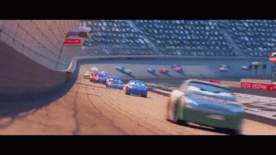 Cars Racing On A Track With A Sign That Says Motor Speedway On It GIF