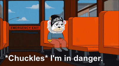Cartoon Bear Wearing Kimba Hat Sitting GIF