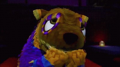 Cartoon Bear With Purple Yellow Eyes Folded Hands GIF
