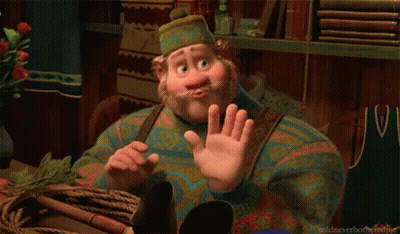Cartoon Bearded Character In Colorful Sweater And Hat GIF