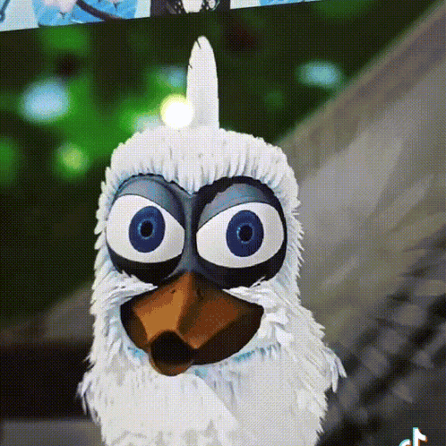 Cartoon Bird With Big Blue Eyes and Feathered Head